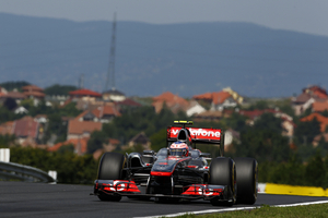 Button Wins a Rainy Race in Hungary