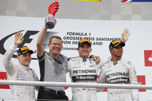 Rosberg went up to the podium alongside Valteri Bottas and Lewis Hamilton