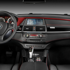 The interior gets Merino leather with red trim