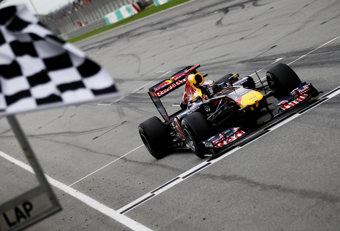 Vettel continues winning run in Malaysia