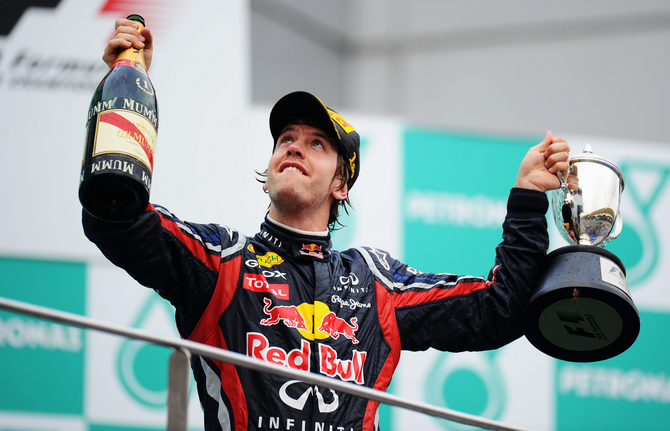 Vettel continues winning run in Malaysia