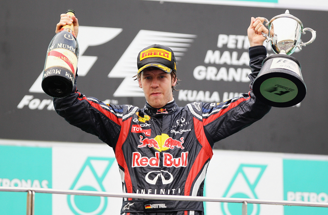 Vettel continues winning run in Malaysia