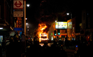 Cars being destroyed with London riots