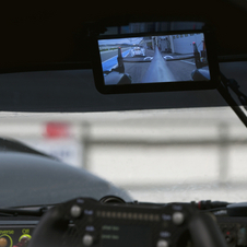 The screen is mounted in the same location as a normal rear-view mirror