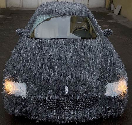 Maserati covered with 1,763 lbs of shattered glass