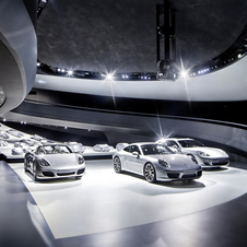 The interior has Porsche models in 1:3 scale and three current, real  cars