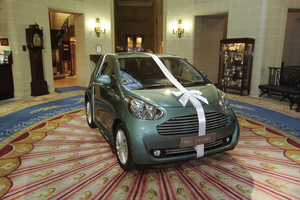 Sir Stirling Moss offers Aston Martin Cygnet to his wife