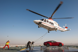 The car was delivered to the helipad be helicopter