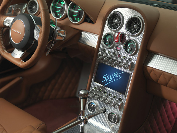 The B6 has Spyker's well known touches like the exposed gearshift and metal toggle switches