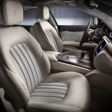 The interior gets high quality, moka leather