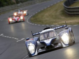 Audi and Peugeot fighting for victory in the 24 Hours of Le Mans