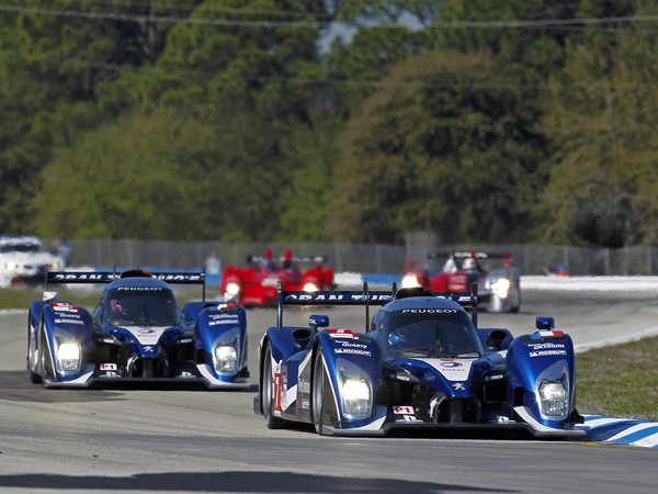 Audi and Peugeot fighting for victory in the 24 Hours of Le Mans